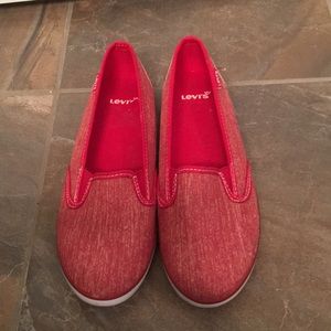 Red slip-on sneakers